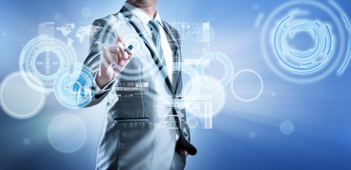 Business Man In Blue Grey Suit Using Digital Pen Working With Di