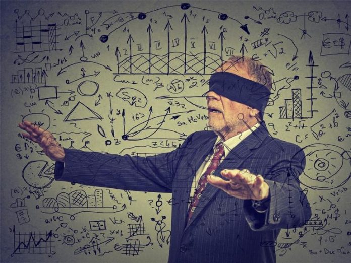 blindfolded senior business man walking through social media data